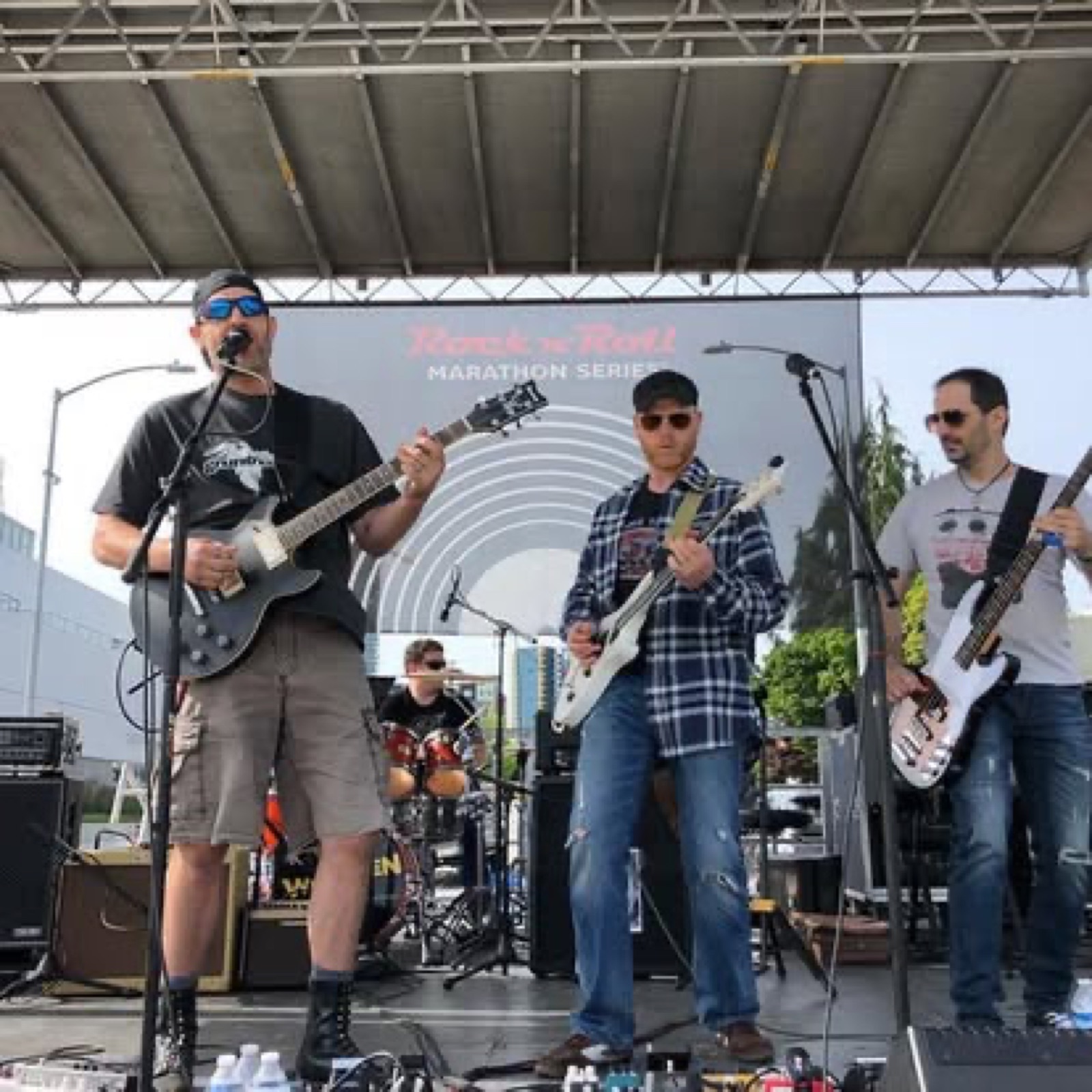 Secondhand Flannel on an outdoor stage